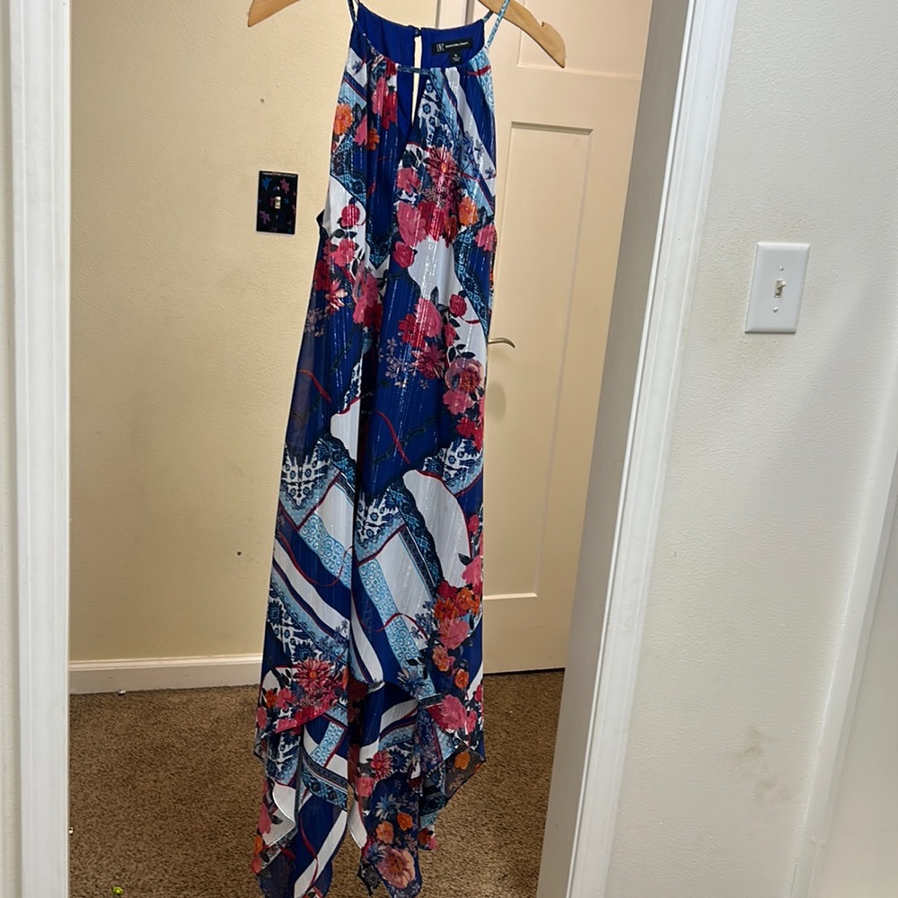 Never worn still has the tag on it with buttons
